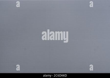 Gray corrugated Metal Sheet Silver Gray Wall Background Stock Photo