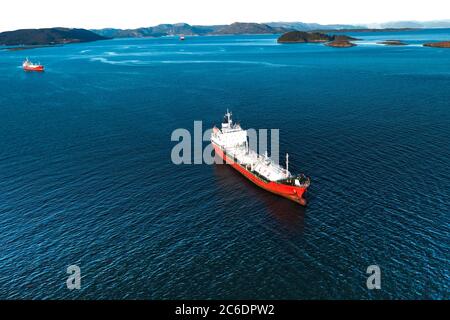 gas carriers anchored in the sea bay at beautiful sunny day Stock Photo
