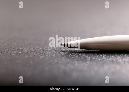 automatic plastic ballpoint pen with clipping path on black background. close up. Stock Photo