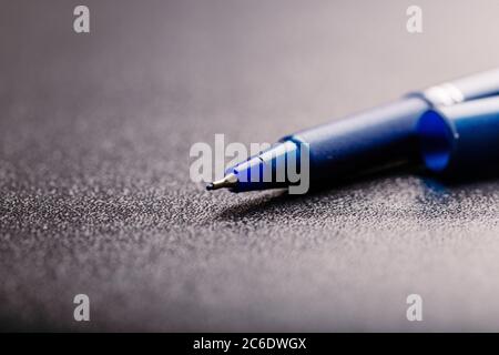 automatic plastic ballpoint pen with clipping path on black background. close up. Stock Photo