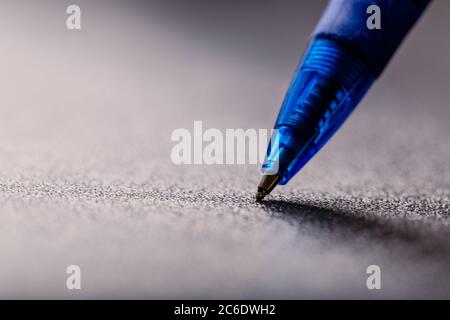 automatic plastic ballpoint pen with clipping path on black background. close up. Stock Photo