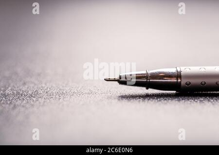 automatic plastic ballpoint pen with clipping path on black background. close up. Stock Photo