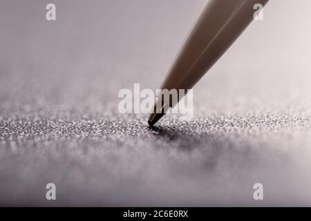 automatic plastic ballpoint pen with clipping path on black background. close up. Stock Photo