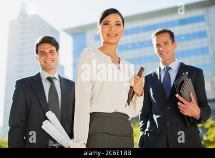 Smiling architects outside urban building Stock Photo