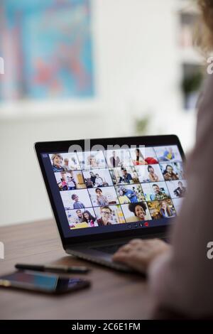 Colleagues video conferencing on laptop screen Stock Photo