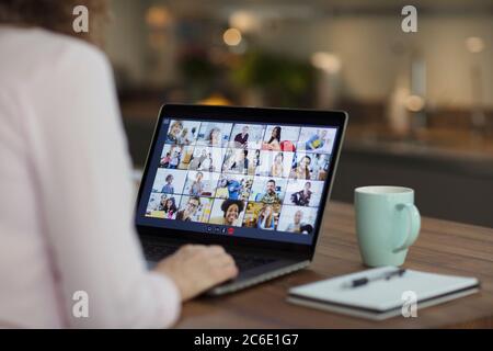 Colleagues video conferencing on laptop screen Stock Photo