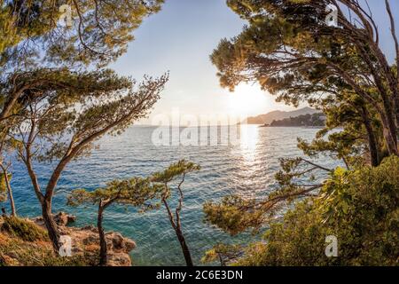 Amazing Croatian beaches against sunset in Brela, Dalmatia, Croatia Stock Photo