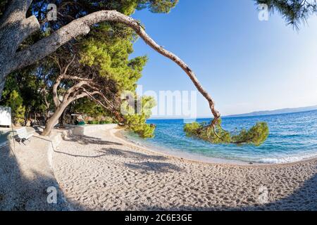 Amazing Croatian beaches against sunset in Brela, Dalmatia, Croatia Stock Photo