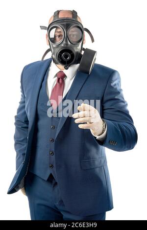 man in business suit wearing gas mask for protection Stock Photo