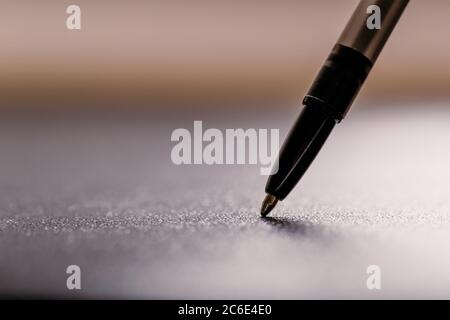 automatic plastic ballpoint pen with clipping path on black background. close up. Stock Photo
