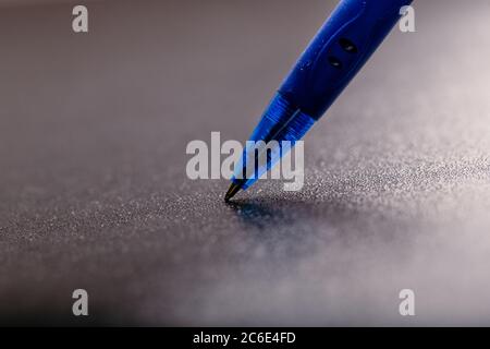 automatic plastic ballpoint pen with clipping path on black background. close up. Stock Photo