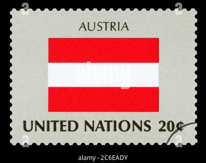 AUSTRIA - Postage Stamp of Austria national flag, Series of United Nations, circa 1984. Isolated on black background. Stock Photo