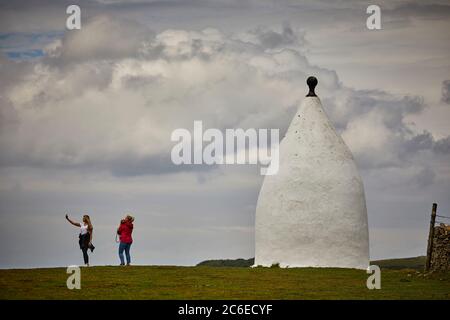 Bollington town in Cheshire  Grade II listed landmark White Nancy  structure at the top of Kerridge Hill originally a summer house or a folly by 1817 Stock Photo