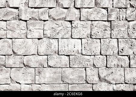 Pattern of decorative stone wall surface with cement. Stock Photo