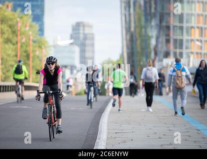 Londoners cycling and walking Blackfriars Bridge.  July 6, 2020. London, UK. Stock Photo