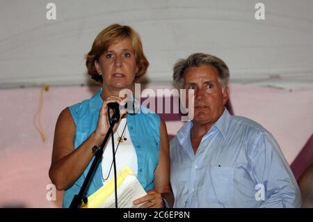 Camp Casey II, Texas:  August 28, 2005:  Actor Martin Sheen (right) with Cindy Sheehan (left) on stage at Camp Casey outside Crawford, near President Bush ranch. Crawford,  Sheehan, whose son Casey died in action in Iraq in 2004, has organized a series of protests near the Bushes' Texas ranch during the president's summer vacation there.  ©Bob Daemmrich Stock Photo