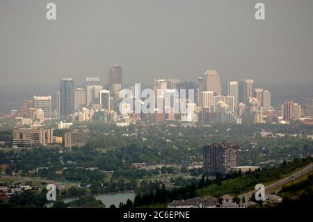 Calgary, Alberta CANADA July 27, 2005: Skyline of Calgary in the summertime from Canada Olympic Park ski jump area. ©Bob Daemmrich Stock Photo