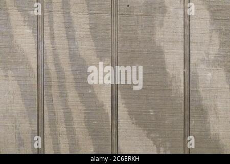 a sanded grooved wood wall panel background backdrop Stock Photo
