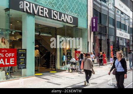 Cork, Ireland. 9th July, 2020. River Island in Opera Lane, Cork city, was busy today, with people queuing to shop inside the store. Credit: AG News/Alamy Live News Stock Photo