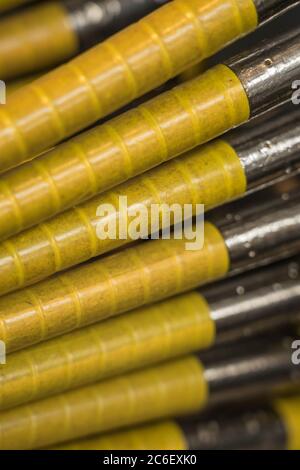 spindles for thread and use in looms Stock Photo