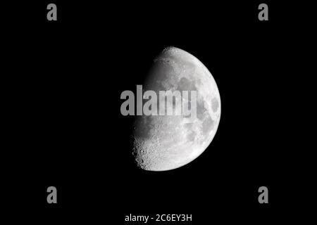 Waxing gibbous moon (about 66% illuminated) at night as seen through a 80mm ED-APO refractor telescope in prime focus (600mm focal lenght). Two major Stock Photo