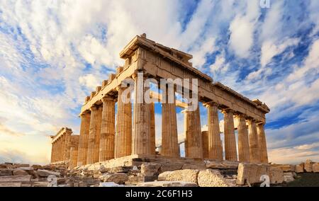 Parthenon temple on a sinset. Acropolis in Athens, Greece. The Parthenon is a temple on the Athenian Acropolis in Greece, dedicated to the goddess Ath Stock Photo