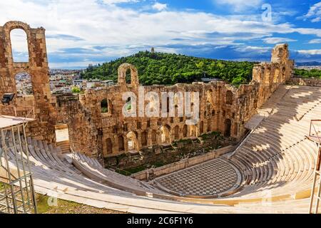 The Odeon of Herodes Atticus (also called Herodeion or Herodion) is a stone Roman theater located on the Acropolis of Athens, Greece. Antique open air Stock Photo