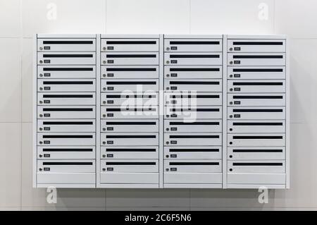 Mailboxes on the wall in an apartment building Stock Photo