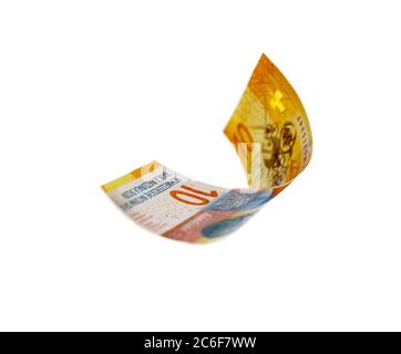 Flying Swiss money - 10 francs note isolated with clipping path Stock Photo
