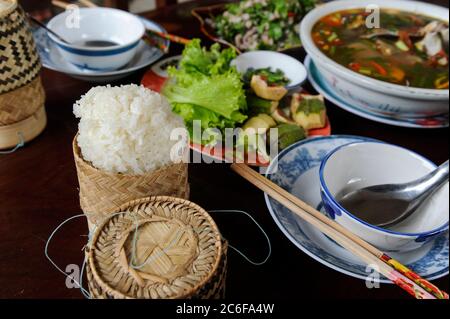 LAO PDR, fish soup and sticky rice / Laos, Fischsuppe und Klebreis Stock Photo