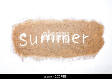 Word Summer on Sand isolated on White Background. Top View. Flat Lay. Stock Photo