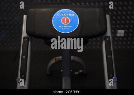 An 'Out Of Use' marker on an exercise machine inside the Gym Group in Vauxhall, London, after it was announced that gyms will be allowed to reopen from 25 July.