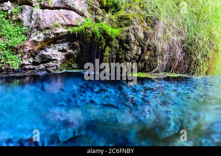 Blue sulfur water in Kaklik Cave which is near modern city Denizli in Turkey. Stock Photo