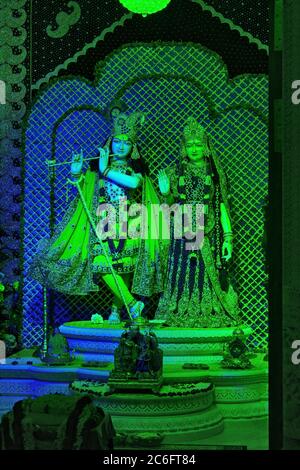 Mathura, India - May 10, 2012: Interior of Prem mandir ( Love Temple aka hindu temple ) containing God Krishna and Radha sculpture located in Vrindava Stock Photo