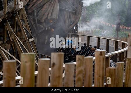 Alton, UK. 9th July 2020. Thrill seekers wear face masks while riding the Wickerman roller coaster after the park opens after the lifting of Covid-19/ Coronavirus lockdown restrictions. Credit: Jason Chillmaid/Alamy Live News Stock Photo