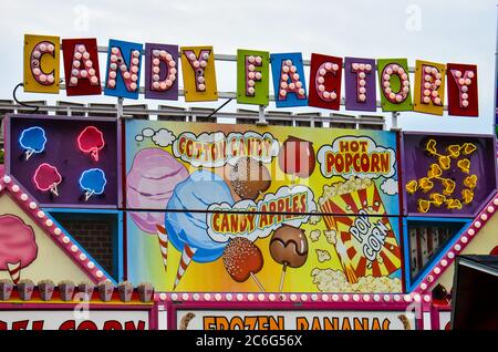 Falcon Heights, Minnesota - August 29, 2018: Candy Factory sweets booth selling popcorn, candy apples and cotton candy at the Minnesota State Fair Stock Photo
