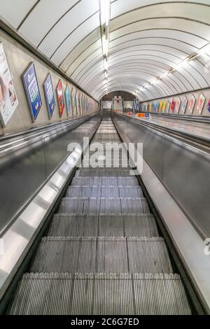 LONDON, ENGLAND - JUNE 8, 2020:  London Underground escalator requiring social distancing measures during COVID-19 pandemic - 064