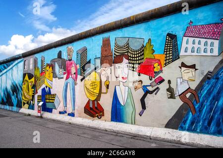 Berlin, Germany,06/14/2020: Berlin Wall Painting by Pop Art artist Jim Avignon who painted the East Side Gallery of the Berlin Wall in 1990