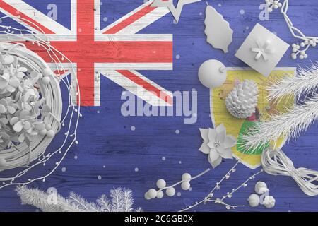 Turks And Caicos Islands flag on wooden table with snow objects. Christmas and new year background, celebration national concept with white decor. Stock Photo