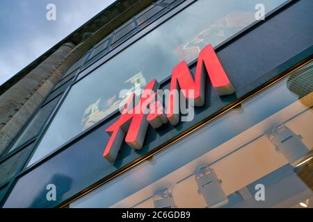 H&M logo is seen in the store in Krakow, Poland on August 31, 2021. (Photo  by Jakub Porzycki/NurPhoto Stock Photo - Alamy
