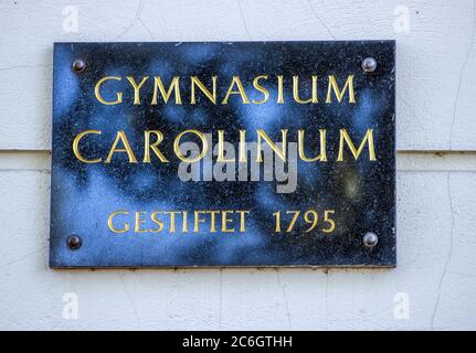 Neustrelitz, Germany. 23rd June, 2020. The door sign at the Gymnasium Carolinum donated 1795 in Neustrelitz. Credit: Jens Büttner/dpa-Zentralbild/ZB/dpa/Alamy Live News Stock Photo