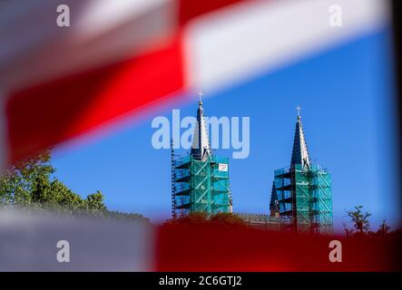 Neustrelitz, Germany. 23rd June, 2020. The castle church is completely scaffolded due to renovation work. The neo-Gothic church on Hertelstraße was built between 1855 and 1859. Credit: Jens Büttner/dpa-Zentralbild/ZB/dpa/Alamy Live News Stock Photo