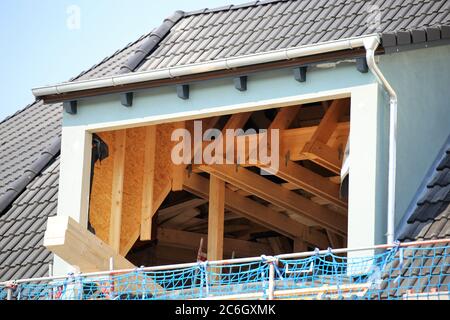 Roof extansions on a residential home Stock Photo