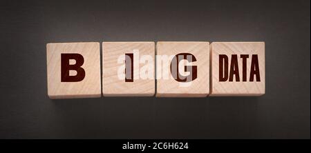 Big Data, words on wooden cubes on black. Database 5G technology concept Stock Photo
