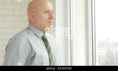 Businessman Presentation in Office Room, Businessperson Image Looking Out of His Office Window Stock Photo