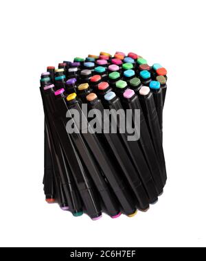 Close up selective focus of stack of Colored Pens Markers on white isolated Background. Back to school and offices stationary concept. Stock Photo