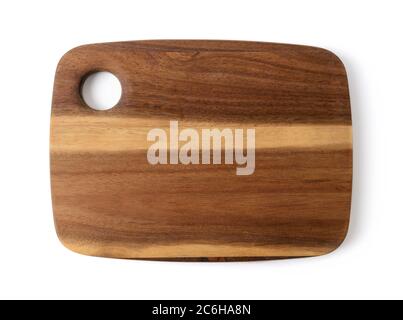 New cutting or serving board of acacia wood isolated on white background. New rectangular chopping board. Modern kitchen utensils of natural materials Stock Photo