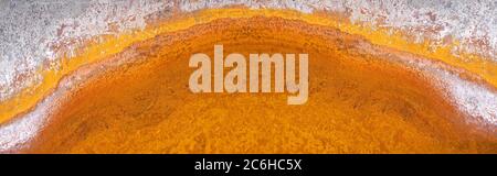 Abstract semicircle pattern of orange rust Stock Photo