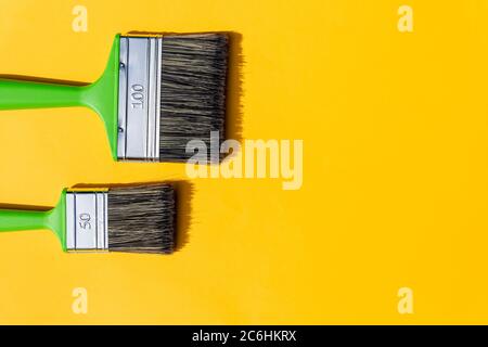 Painting tools. Brushes and roller.Painting supplies paint roller and brush in the accessories for home renovation.tool for repairing and painting Stock Photo