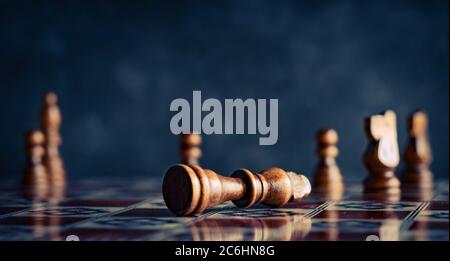 Chess pieces on a chess board with king and pawns. Stock Photo